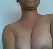 Amateur indian chick revealing her tits of white bra on a cam.