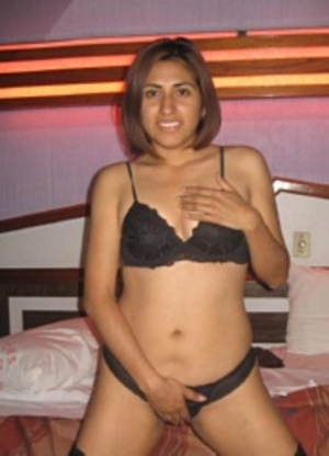 Stunning indian brunette posing on the bed in her sexy black lingerie. - Picture 3