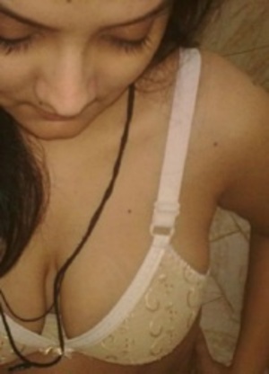 Amateur indian girl posing in white bra and tight red panties. - Picture 8
