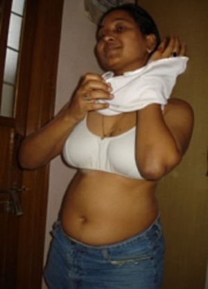 Big tits indian chubby girl has no panties under her jeans miniskirt. - Picture 2