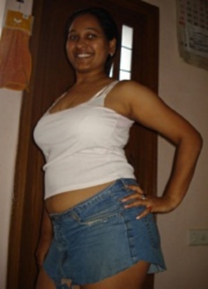 Big tits indian chubby girl has no panties under her jeans miniskirt. - Picture 4