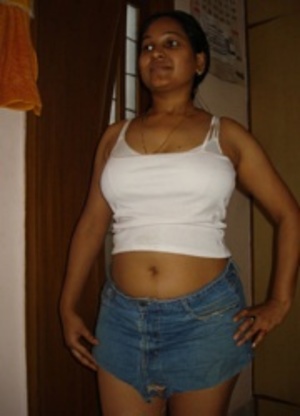 Big tits indian chubby girl has no panties under her jeans miniskirt. - Picture 6