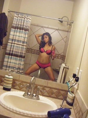 Delicious indian cutie taking off her pink undies and flashing her twat in the bath tub. - Picture 2