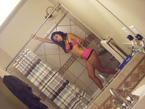 Delicious indian cutie taking off her pink undies and flashing her twat in the bath tub. - Picture 3