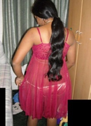 Chubby indian bimbo slowly taking off her pink peignoir and posing in undies. - Picture 1