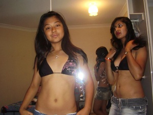 Two lovely indian college girls teasing in black bras and miniskirts. - Picture 1