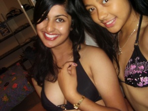 Two lovely indian college girls teasing in black bras and miniskirts. - Picture 14