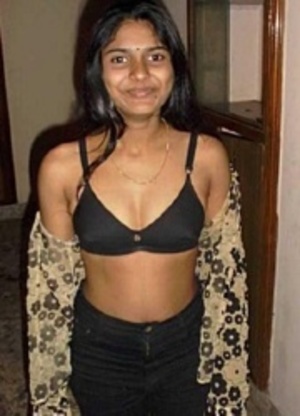 Indian young stunner taking off her black bra just to show you her sexy tits. - Picture 3