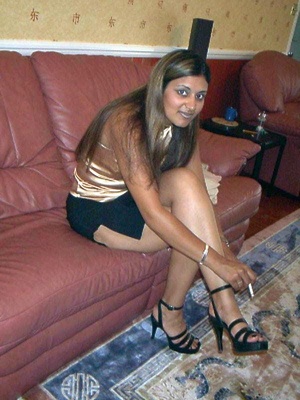 Horny indian cutie taking off her miniskirt and black panties just to show her shaved twat. - Picture 2