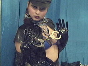Naughty babe in leather suite playing wi - Picture 4