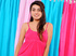 Seductive spinner Danni Dillion teasingly lifts her pink top