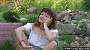 Brunette mature slut takes off white blouse and skirt and posing stark-naked in the garden - Picture 3