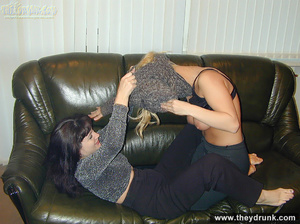 Blond and black lesbians lick each other on the leather couch - Picture 2