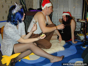 Guy plays with two horny girls at christmas - Picture 7