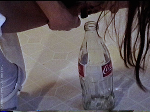 Getting joy our riding on such Homemade Sex Toys as empty Cola bottle - Picture 2