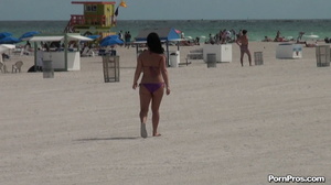 While on the beach, some public sex angel ripped her violet bra off her boobs - Picture 1