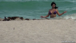 While on the beach, some public sex angel ripped her violet bra off her boobs - Picture 2