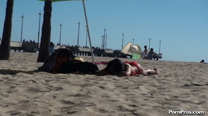 Lying on the beach, her solitude was disturbed by some public nudity guy - Picture 2