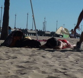 Lying on the beach, her solitude was disturbed by some public nudity guy