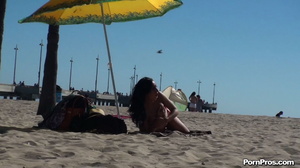 Lying on the beach, her solitude was disturbed by some public nudity guy - Picture 4