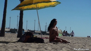 Lying on the beach, her solitude was disturbed by some public nudity guy - XXXonXXX - Pic 5