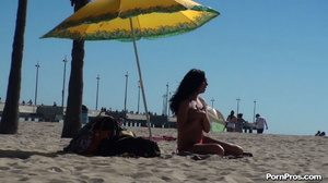 Lying on the beach, her solitude was disturbed by some public nudity guy - Picture 6