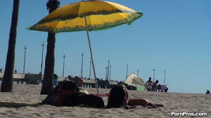 Lying on the beach, her solitude was disturbed by some public nudity guy - Picture 9