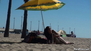 Lying on the beach, her solitude was disturbed by some public nudity guy - Picture 11