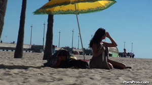 Lying on the beach, her solitude was disturbed by some public nudity guy - Picture 13