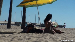 Lying on the beach, her solitude was disturbed by some public nudity guy - Picture 16