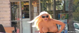 Dropped boobs out of black dress violently, having committed a public nudity act - Picture 10