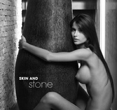 Perfect tits erotic bimbo seductively posing naked and teasing on a cam.