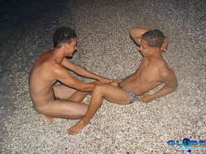 Bonking with black gay dicks on pebbles and on lilo - Picture 4