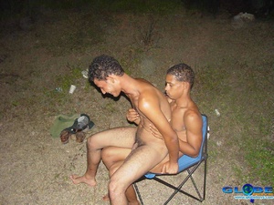 Bonking with black gay dicks on pebbles and on lilo - Picture 14