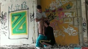 Two young guys having gay sex in the abandoned building