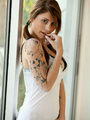 Pigtailed tattooed in short skirt gets - Picture 3
