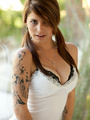Pigtailed tattooed in short skirt gets - Picture 4