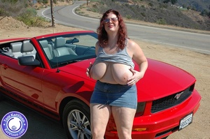 Hot Toni KatVixen posing by a red car - Picture 3