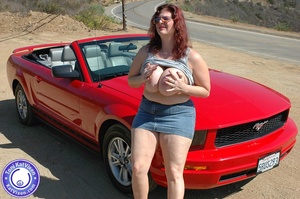 Hot Toni KatVixen posing by a red car - Picture 5