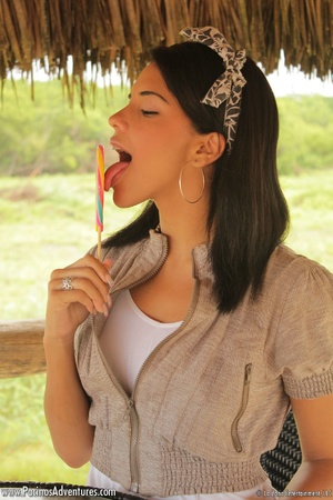 Cool latina teen girl with a lollipop takes off her clothes to seduce you to dirty banging with her nice forms - Picture 3