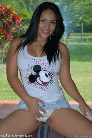 Cool latina hottie in a T-shirt pleasing her pussy with a vibrator - Picture 3