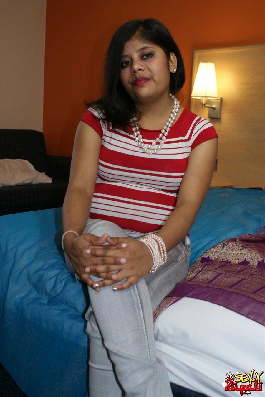 Teen Indian girl takes off her clothes to finger her shaved cooch - XXXonXXX - Pic 1