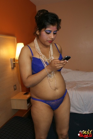 Lustful Indian fatty in blue lingerie and beads gets naked and fondles her chubby body - Picture 1