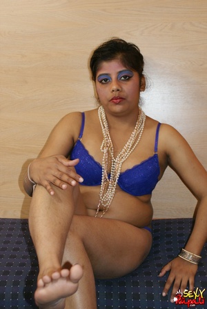 Lustful Indian fatty in blue lingerie and beads gets naked and fondles her chubby body - Picture 3