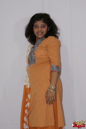 Lewd Indian bitch in orange national costume gets nude to wear her nice lingerie - XXXonXXX - Pic 2