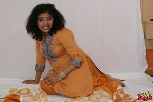Lewd Indian bitch in orange national costume gets nude to wear her nice lingerie - Picture 4