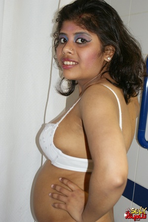 Chubby Indian bitch in white lingerie taking shower in the bathtub - Picture 4