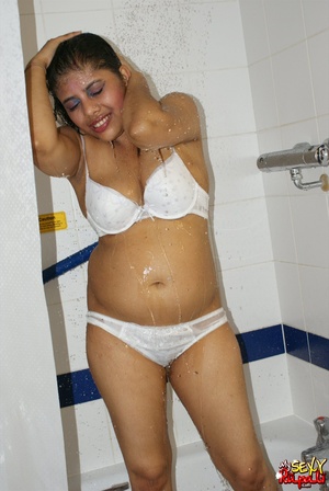 Chubby Indian bitch in white lingerie taking shower in the bathtub - Picture 7