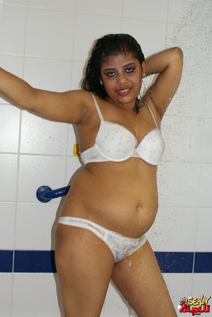 Chubby Indian bitch in white lingerie taking shower in the bathtub - Picture 8