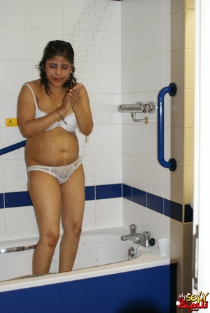 Chubby Indian bitch in white lingerie taking shower in the bathtub - Picture 11